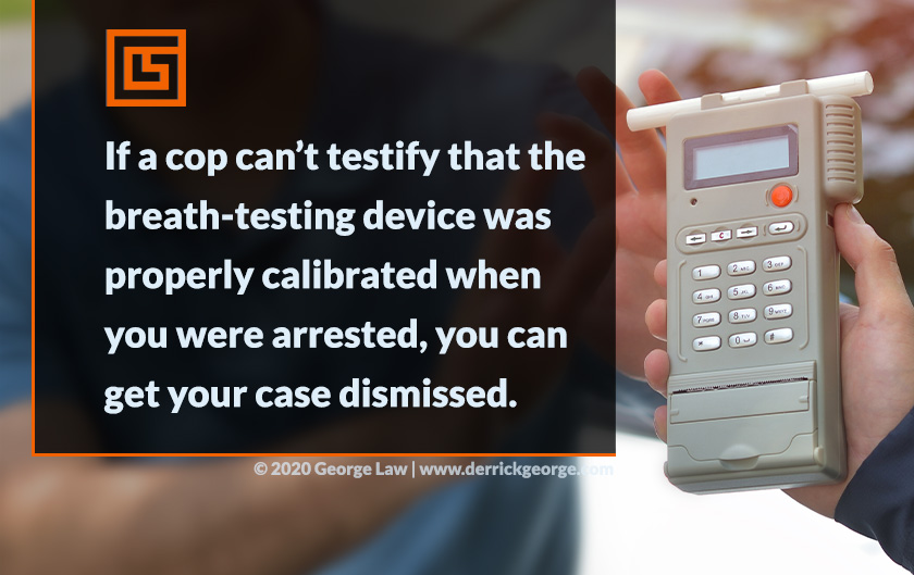 breathalyzer in hand